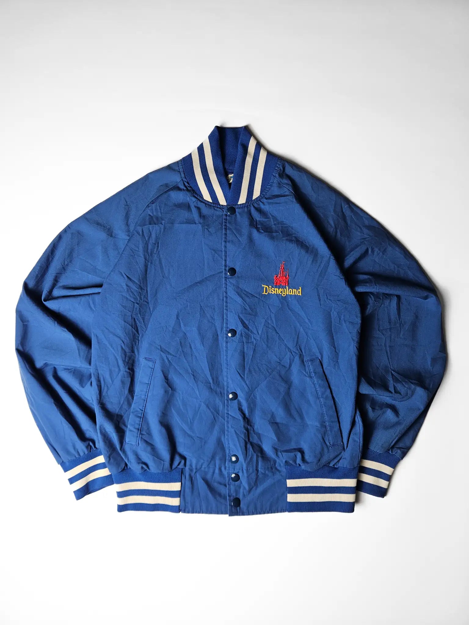 1980s Disneyland varsity jacket voorkant blauw wit XL
