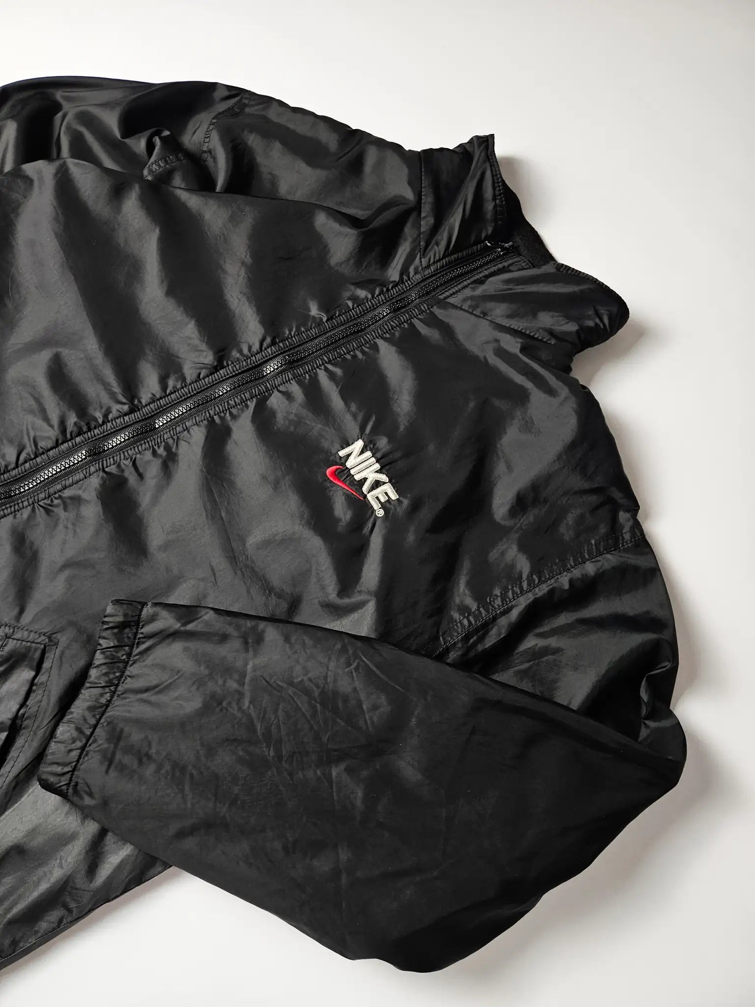 Nike black windbreaker back view embroidered swoosh 1998 2003
