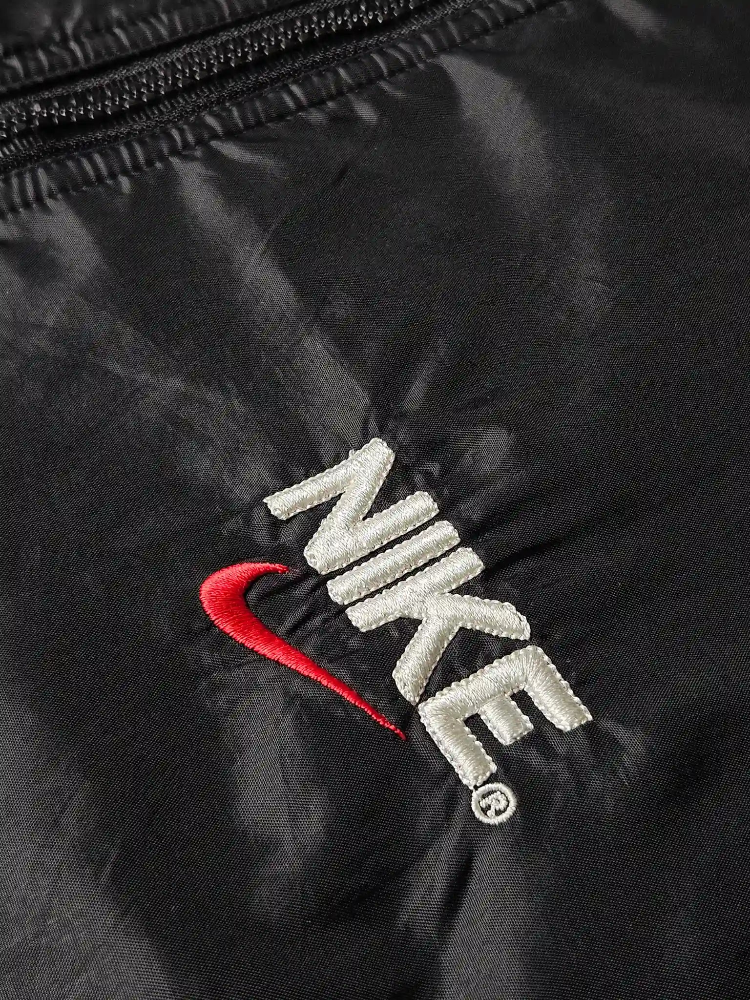 Embroidery detail Nike swoosh black vintage windbreaker

