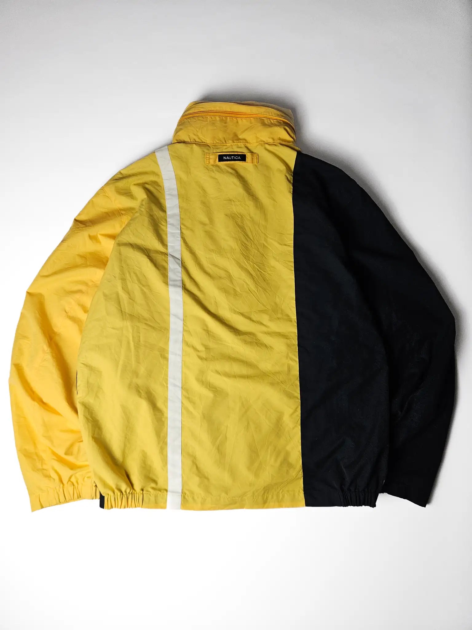 Nautica sailing jacket achterkant yellow black colorblock
