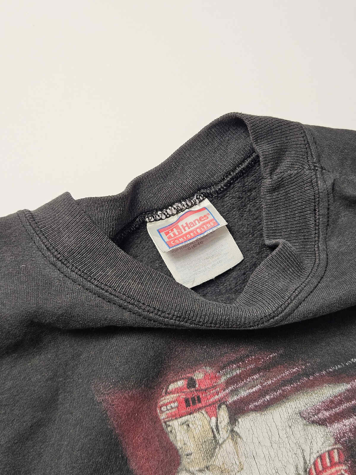 "Origineel Hanes ComfortBlend label op Canada hockey sweater – zachte fleece binnenkant, kenmerkend voor jaren 90 sportwear productie"

