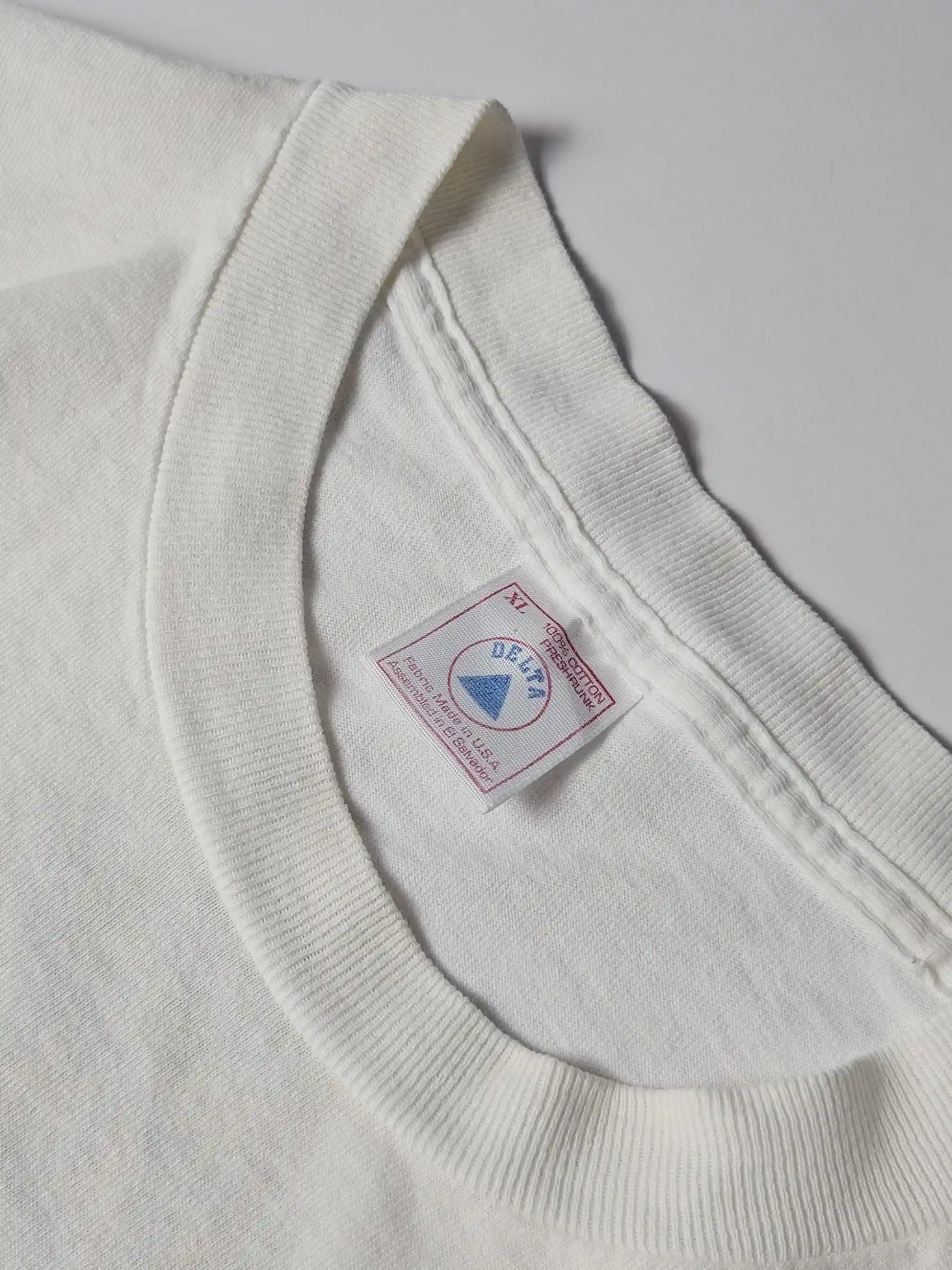 Delta Pro Weight label – Made in USA 100% katoen, typische jaren 90 single stitch vintage T-shirt, belangrijk authenticatiekenmerk voor verzamelaars

