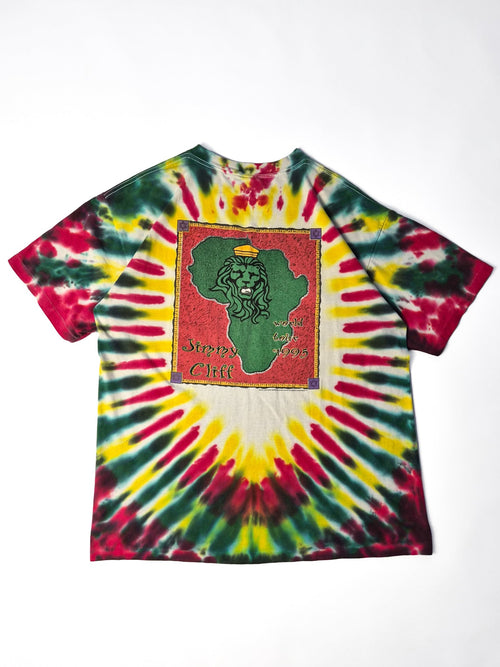 Vintage Jimmy Cliff World Tour T-shirt uit 1995 met grote Afrika- en leeuwgraphic op de rug, in rode, gele en groene tie-dye.