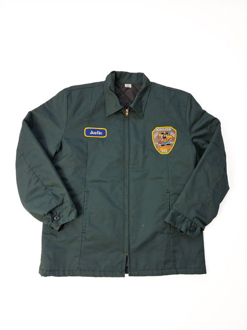 Volledige flatlay 1990s VSFD Engine 341 vintage brandweer-werkjas met patch en naamlabel