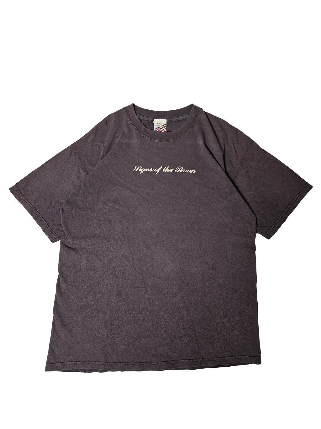 Front van vintage T-shirt met witte tekst "Signs of the Times" op donkerpaarse basis