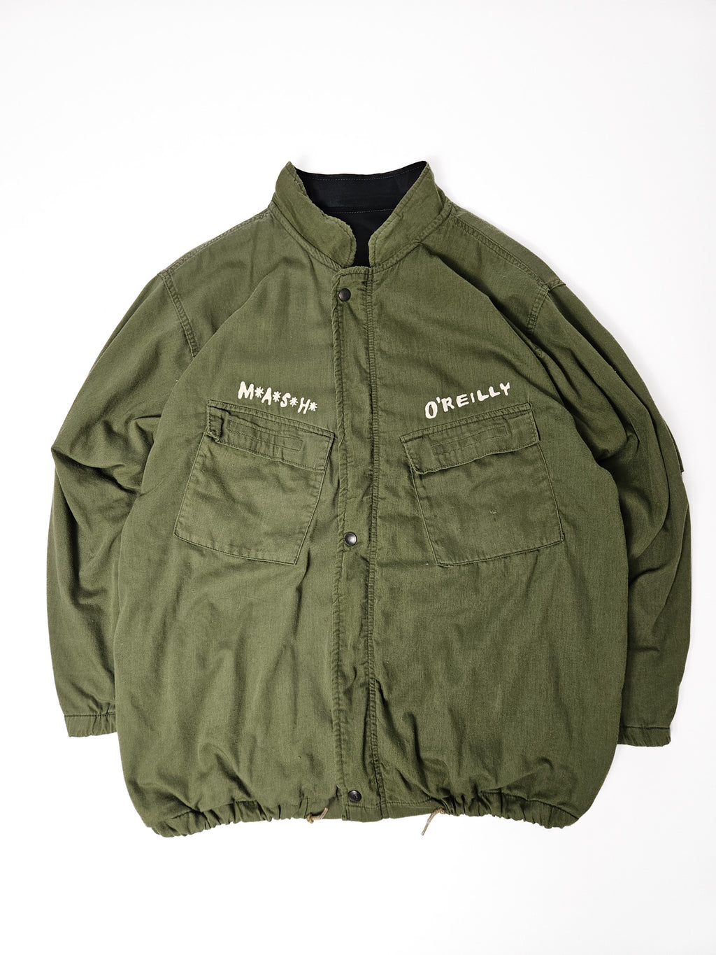 Vintage MASH military jas uit de jaren 80 in olijfgroen, met opgestikte borstpatch en knoopsluiting*

