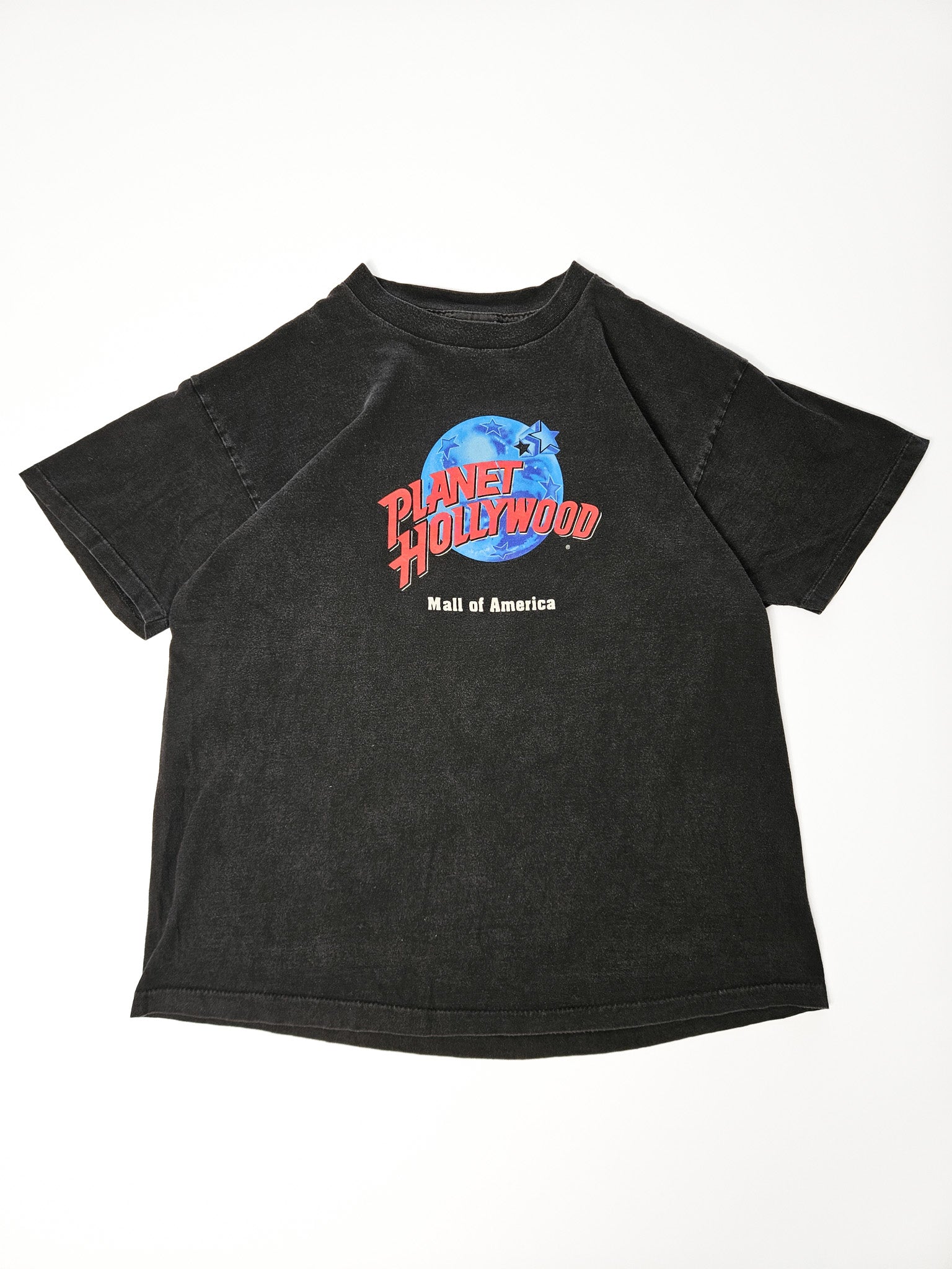 Zwart vintage Planet Hollywood T-shirt uit de jaren 90 met blauw-oranje globe logo van Mall of America op de borst