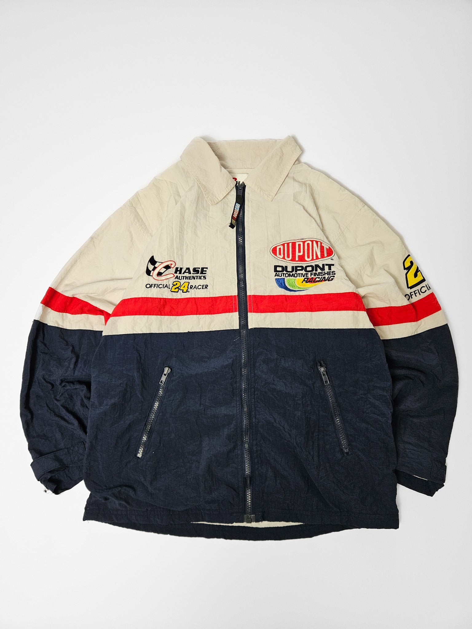 Vintage NASCAR DuPont Jeff Gordon jas uit de jaren 90 met kleurrijke sponsors, patches en ritssluiting

