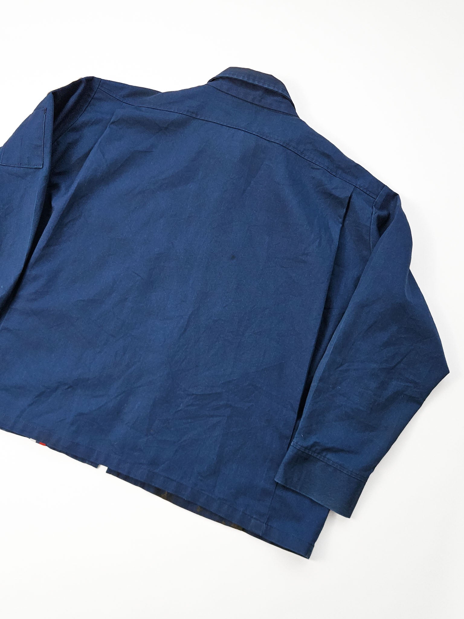 Achterkant 1970s Atlas Van Lines donkerblauwe work jacket met boxy snit