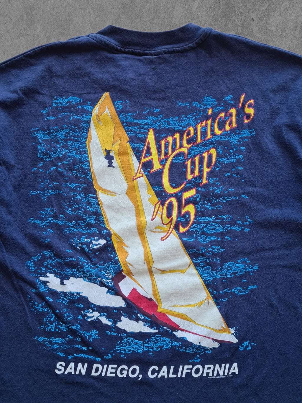 De vintage winkel met tweedehands kleding uit de thrift | 1995 HANES ''AMERICA'S CUP'' T-SHIRT [XL] T-SHIRT