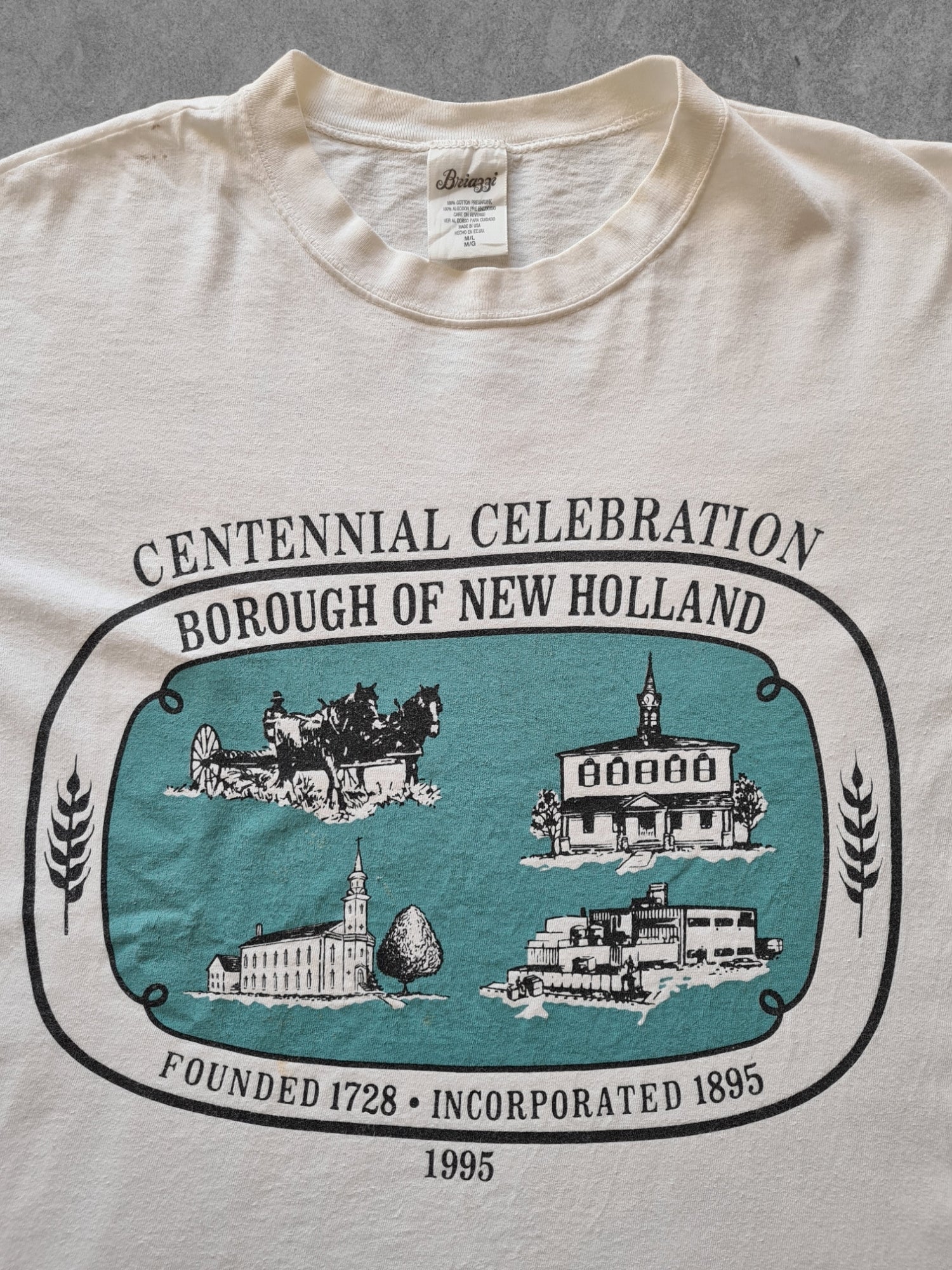 De vintage winkel met tweedehands kleding uit de thrift | 90s BRIAGGI ''NEW HOLLAND'' T-SHIRT [L] T-SHIRT